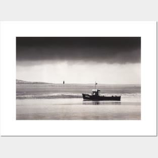 Fishing boat returning to harbour - Conwy estuary, North Wales Posters and Art